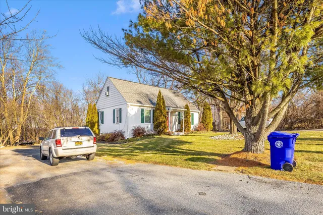 a house with trees in front of it