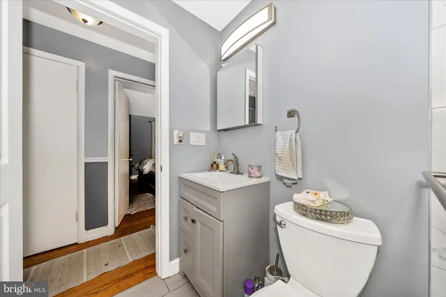 a bathroom with a shower and a toilet