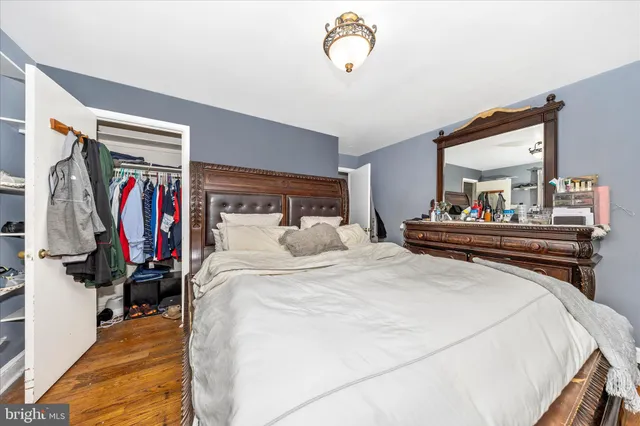 a bed room with furniture and a window