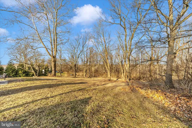 a view of street with parked cars