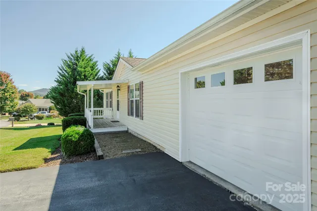 a house view with a garden space
