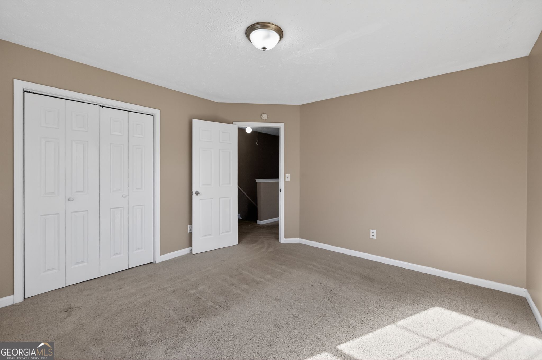 1931 Cornell Way Morrow, GA 30260 - Photo 18 of 33 a view of an empty room with closet and entryway