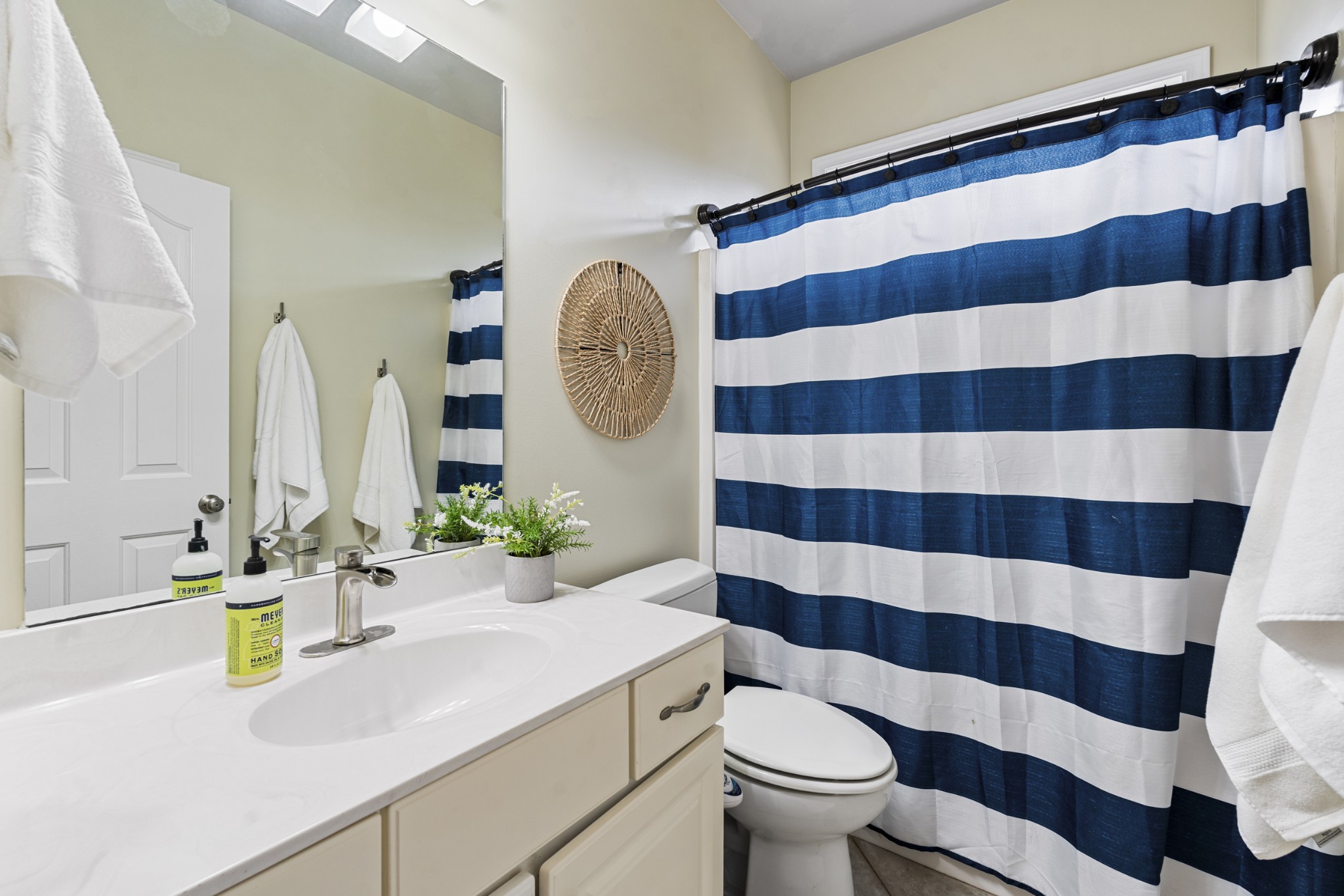 2611 Mission Ridge Drive Murfreesboro, TN 37130 - Photo 21 of 27 a bathroom with a sink and a mirror