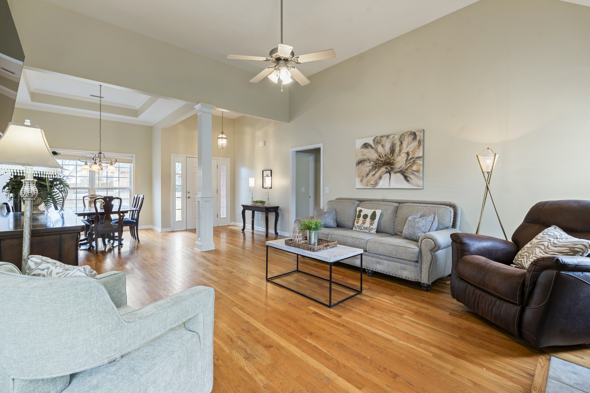 2611 Mission Ridge Drive Murfreesboro, TN 37130 - Photo 9 of 27 a living room with furniture and a chandelier