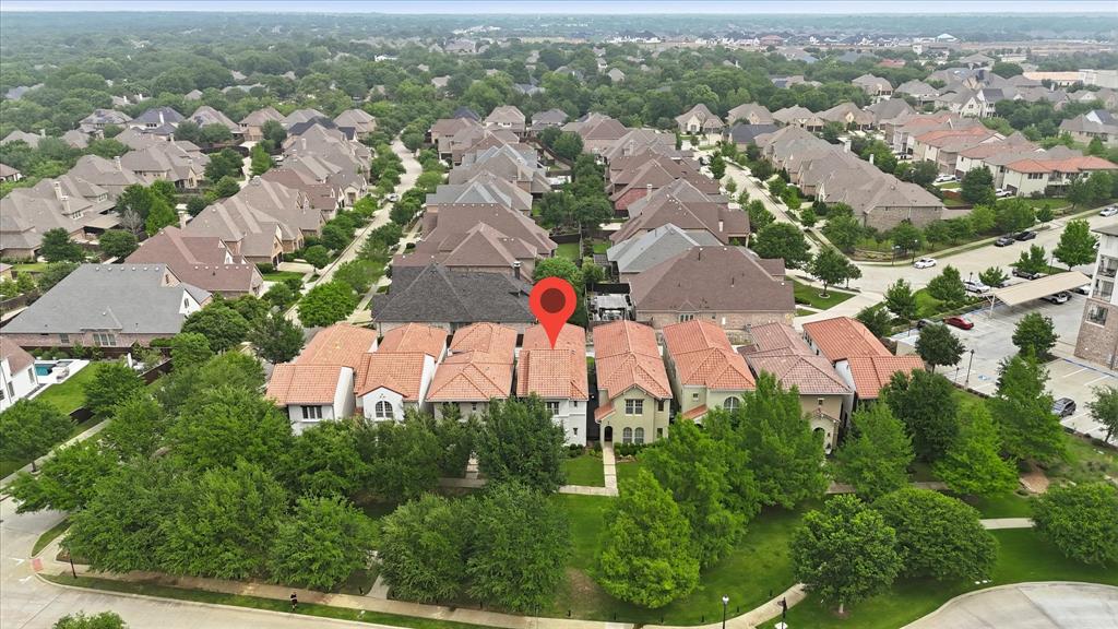 516 Sandy Lane Flower Mound, TX 75022 - Photo 2 of 38 Aerial perspective showcasing a residential neighborhood with varied architectural styles, mature trees, and a developed infrastructure