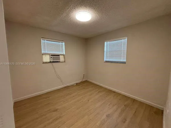 an empty room with a window
