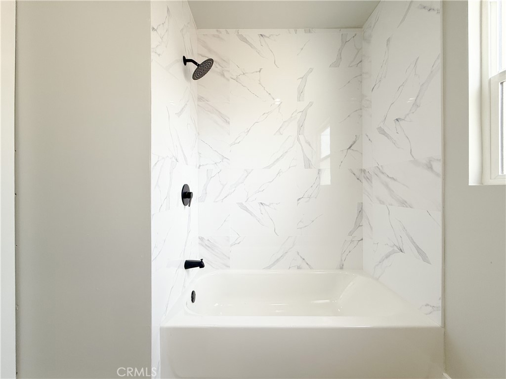 1506 West Stockwell Street Compton, CA 90222 - Photo 18 of 20 a bathroom with a bathtub