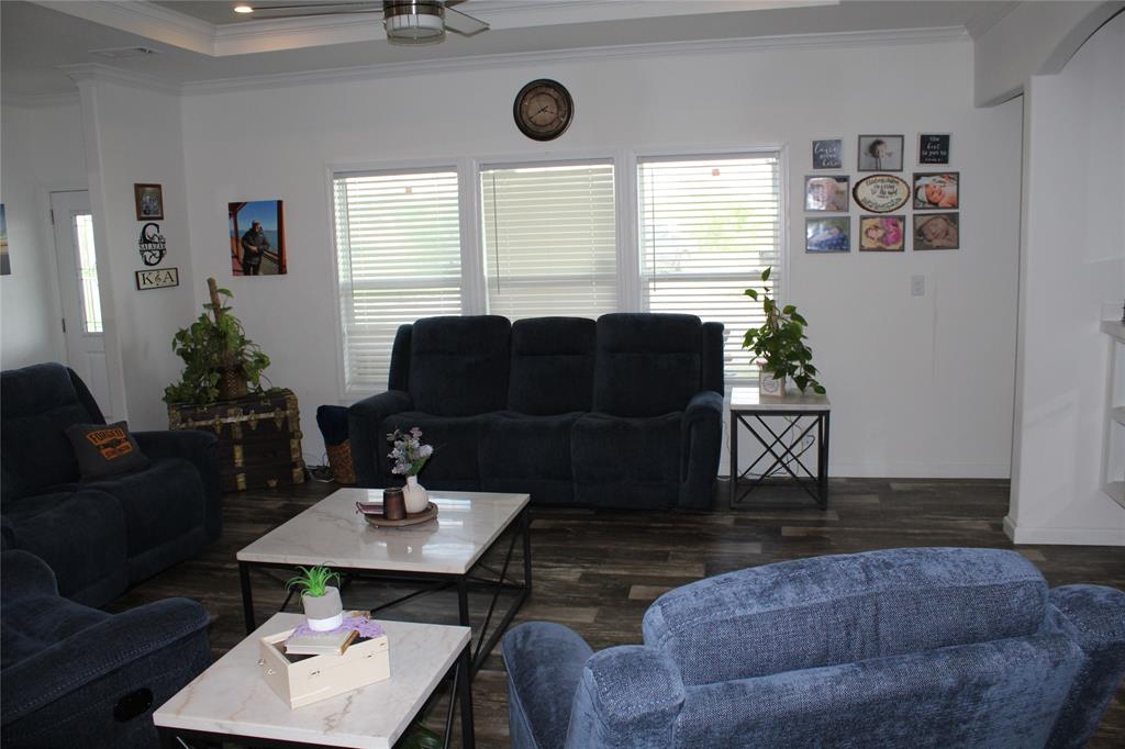 2077 A Shawver Road Perrin, TX 76486 - Photo 7 of 35 a living room with furniture and wooden floor