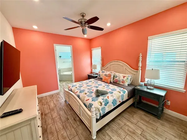a kitchen with a sink a microwave a stove and refrigerator