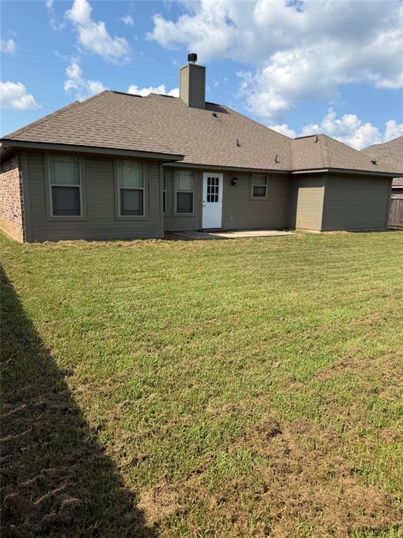 520 Big Red Circle Haughton, LA 71037 - Photo 24 of 25 Expansive rear exterior featuring a multi-level roofline, a brick and siding facade, and a patio area