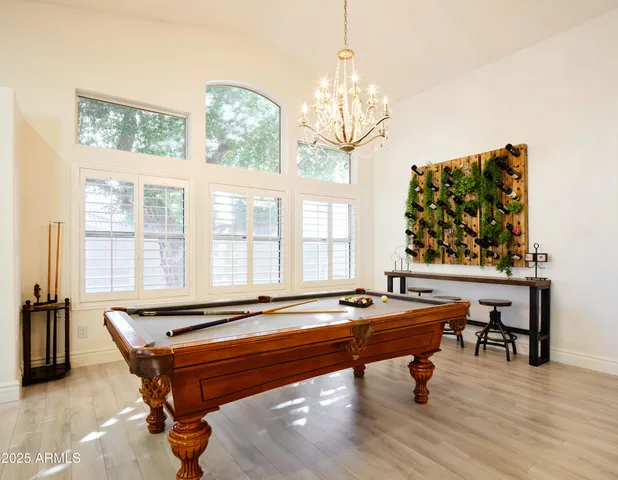 a kitchen with sink cabinets and dining table