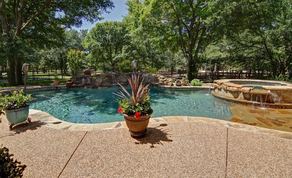 110 Bent Creek Ranch Court Fort Worth, TX 76126 - Photo 12 of 40 a view of a backyard with sitting area