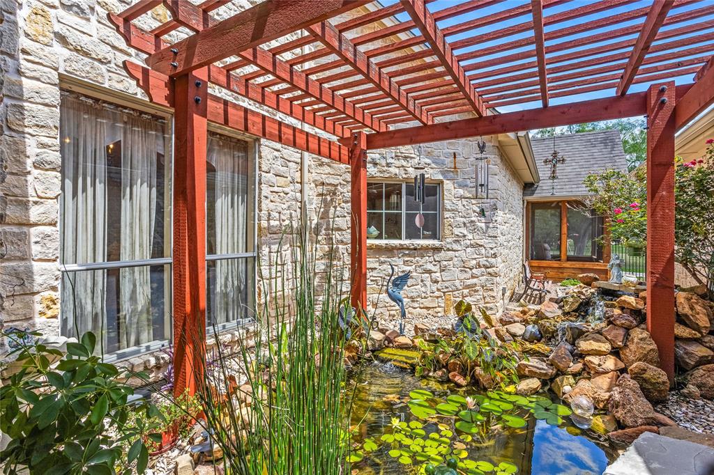110 Bent Creek Ranch Court Fort Worth, TX 76126 - Photo 28 of 40 a view of a backyard with plants