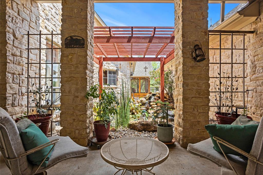 110 Bent Creek Ranch Court Fort Worth, TX 76126 - Photo 30 of 40 a room with furniture and a potted plant