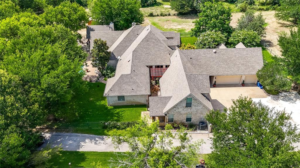 110 Bent Creek Ranch Court Fort Worth, TX 76126 - Photo 38 of 40 an aerial view of a house with a garden