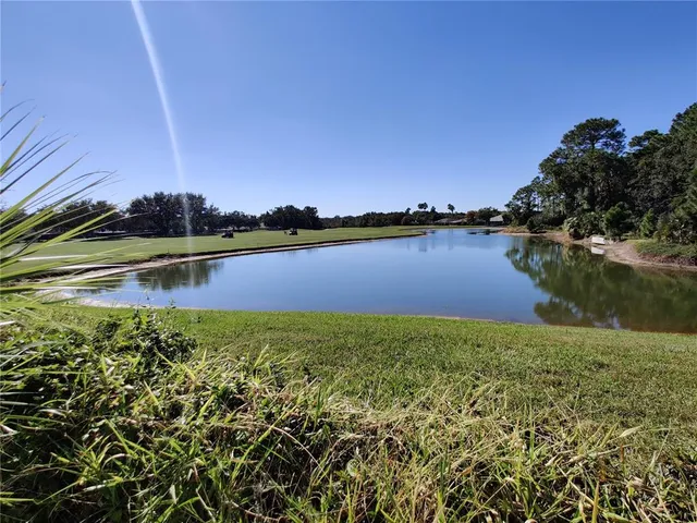 a front view of a house with yard