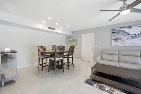 a view of a dining room with furniture