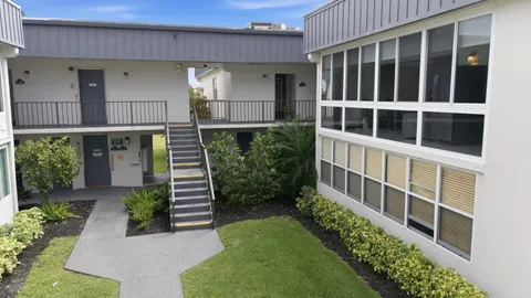 a view of front door of house with outdoor space