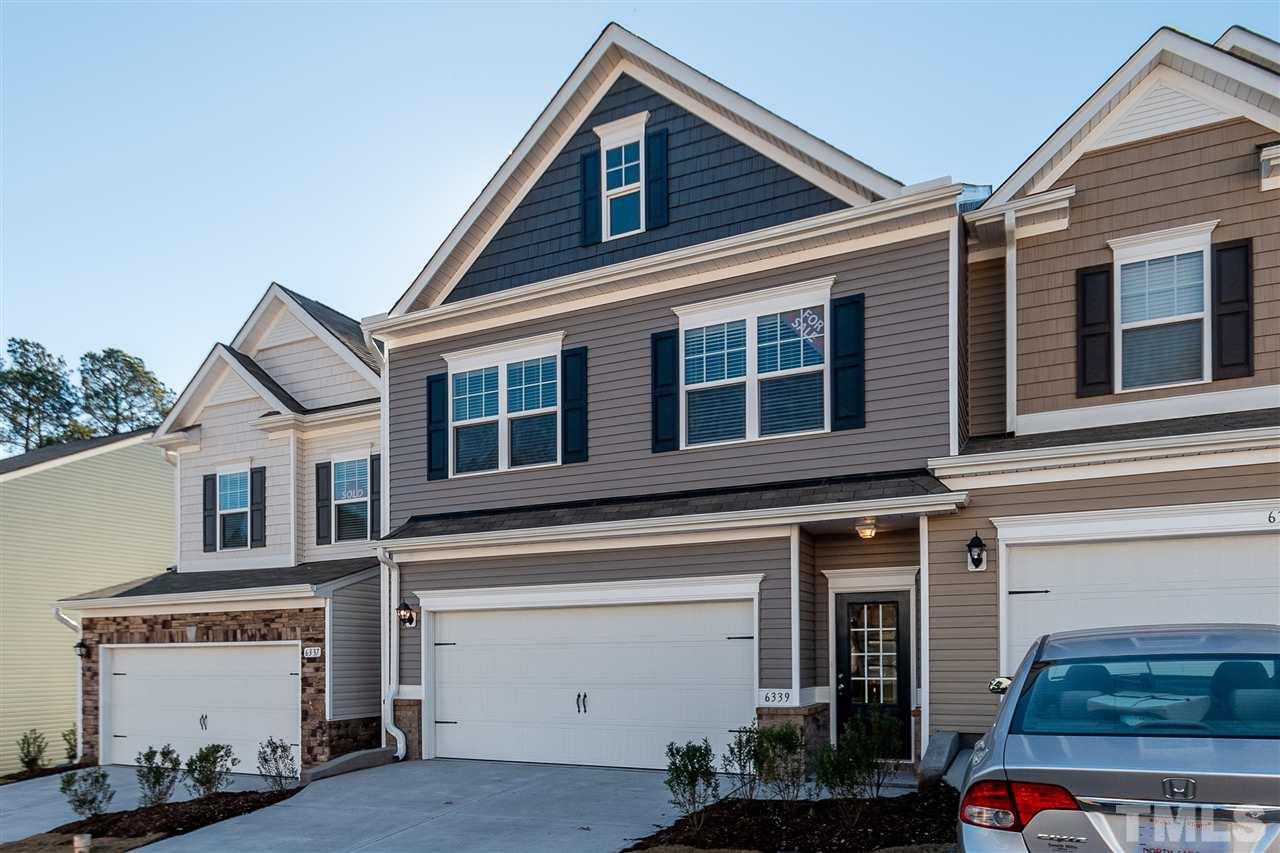6339 Grace Lily Drive, Unit 18 Raleigh, NC 27607 - Photo 2 of 23 a view of a house with a garage