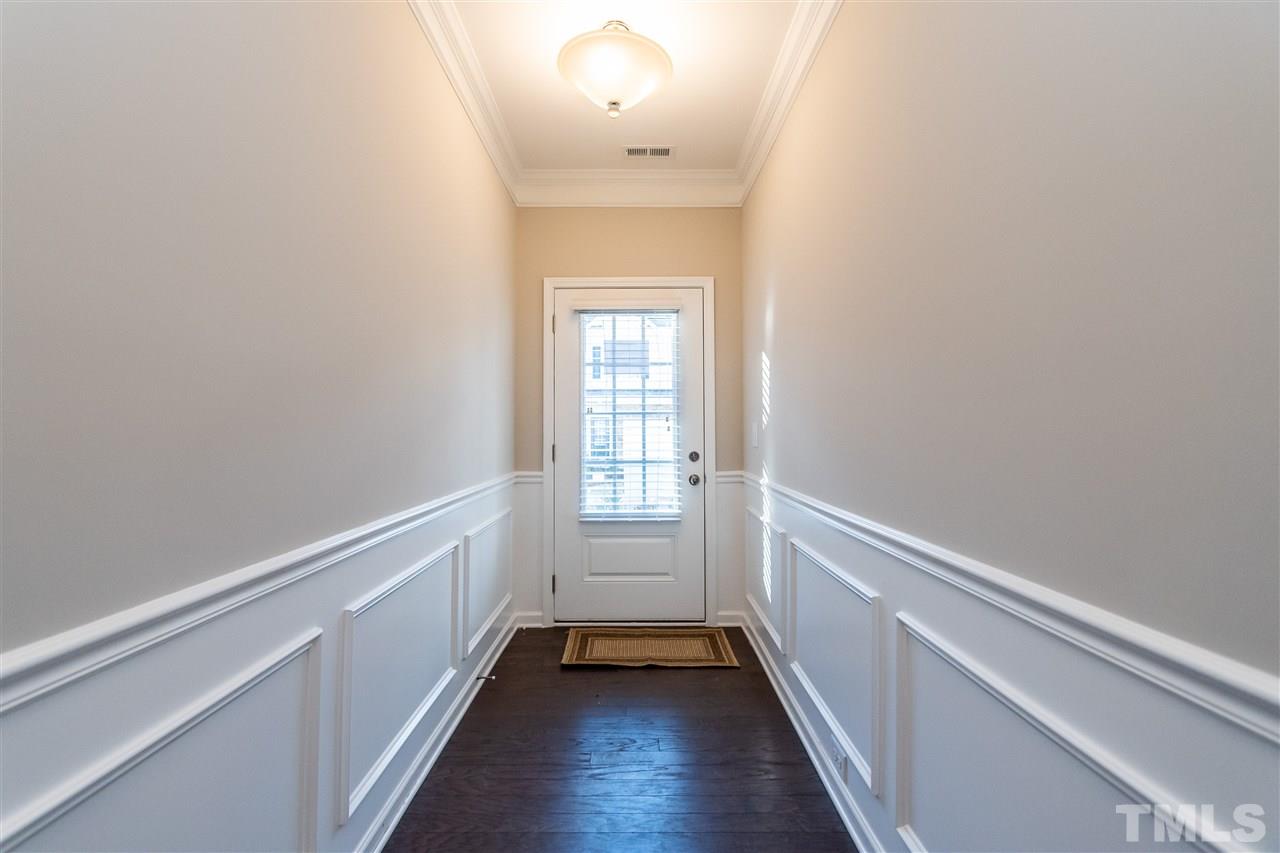 6339 Grace Lily Drive, Unit 18 Raleigh, NC 27607 - Photo 3 of 23 a view of an entryway with wooden floor