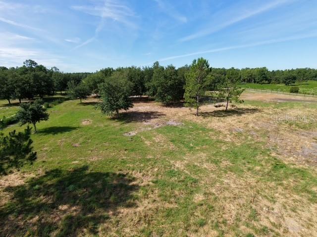 7214 Oil Well Road Clermont, FL 34714 - Photo 15 of 16 a view of a lake with houses in background