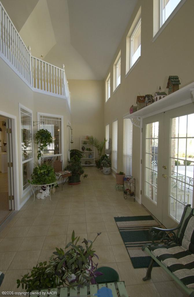 8800 Red Wing Road Amarillo, TX 79119 - Photo 14 of 15 a lobby with furniture and floor to ceiling window