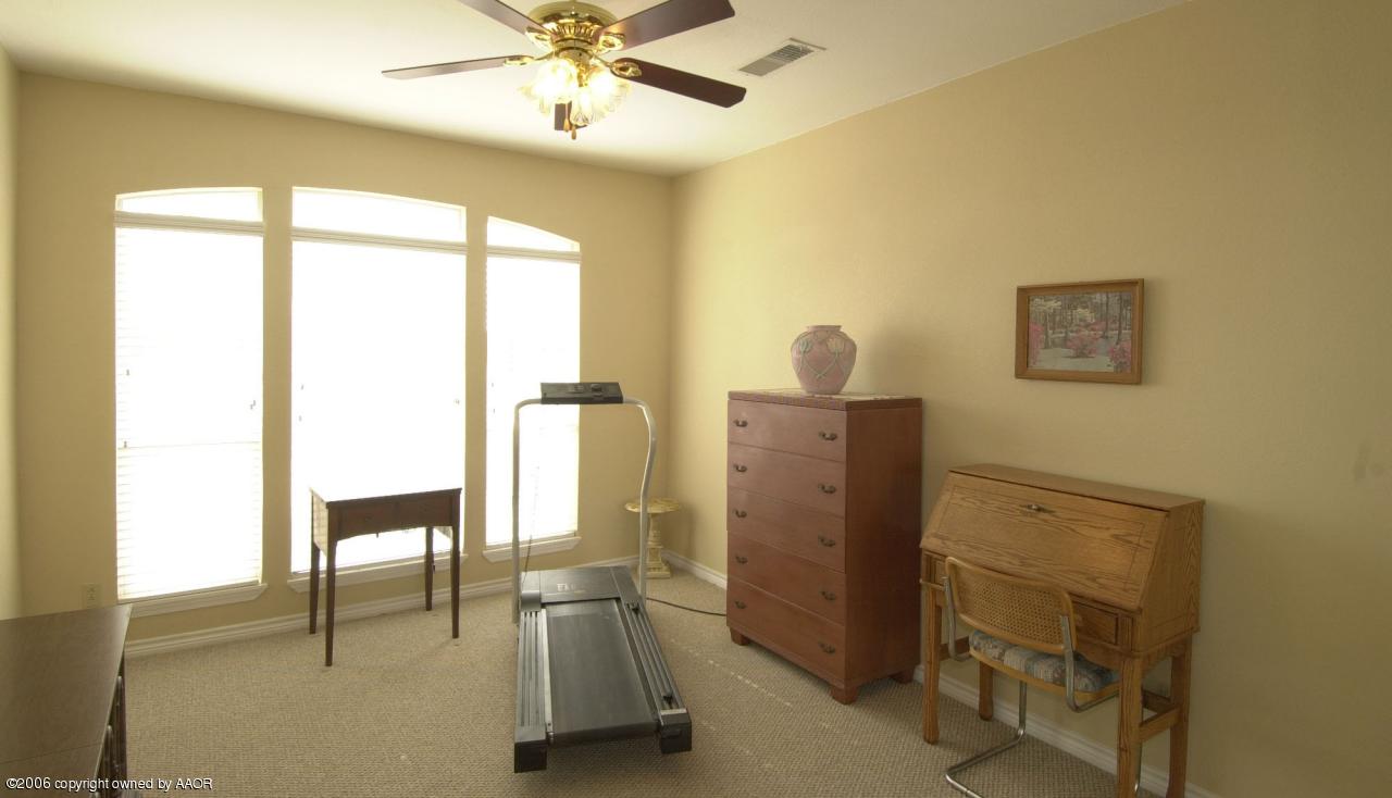 8800 Red Wing Road Amarillo, TX 79119 - Photo 9 of 15 a view of a hallway with workspace