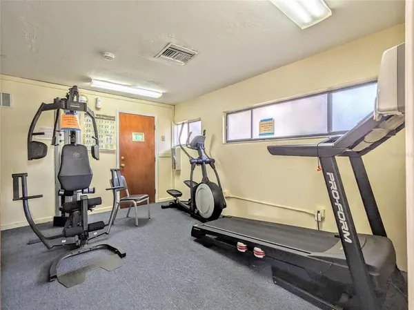 a view of a room with gym equipment
