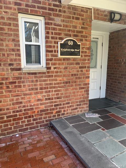 60 Knightsbridge Road, Unit 2H Great Neck, NY 11021 - Photo 1 of 1 a view of a door of the house