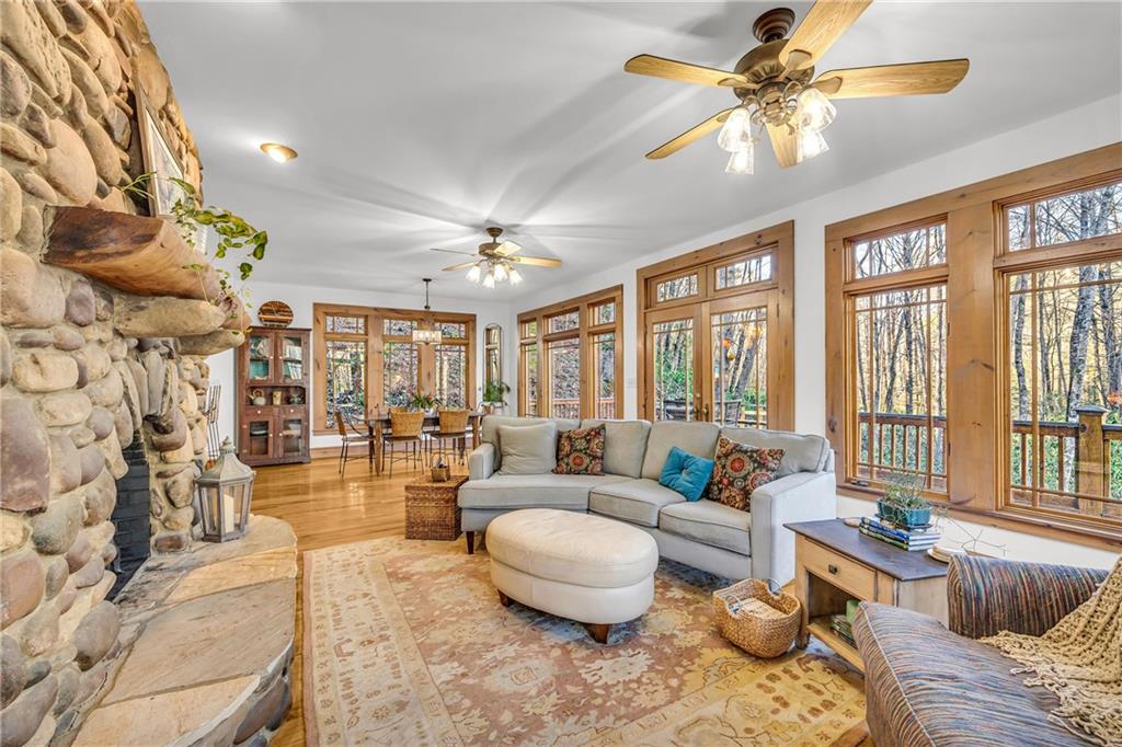 740 Little Rock Creek Road Cherry Log, GA 30522 - Photo 16 of 98 a living room with furniture and a large window
