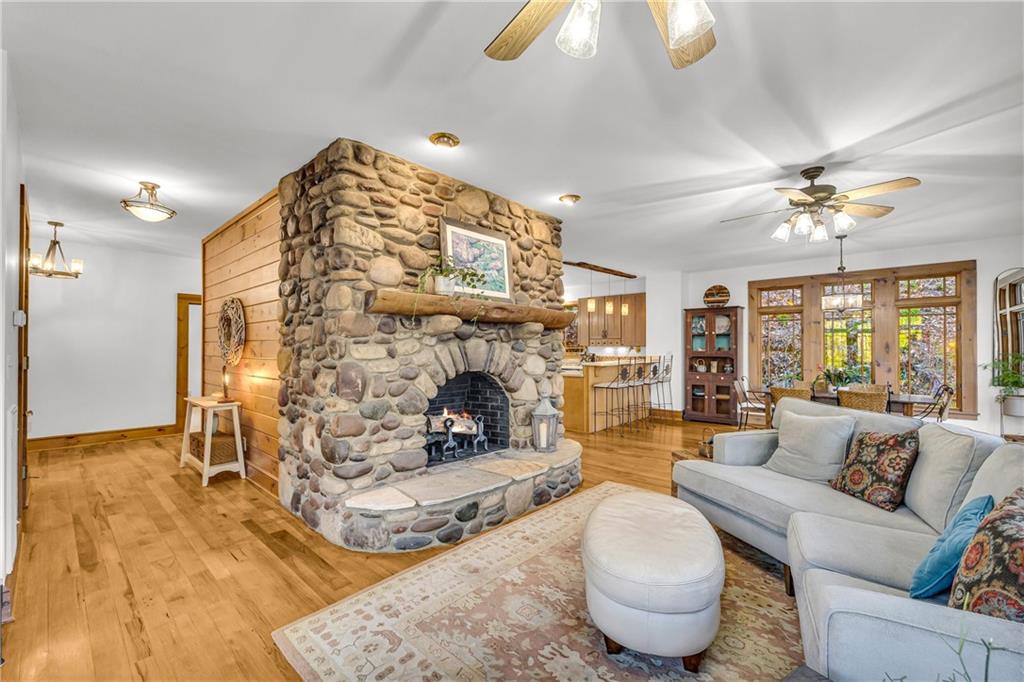 740 Little Rock Creek Road Cherry Log, GA 30522 - Photo 18 of 98 a living room with furniture and a chandelier