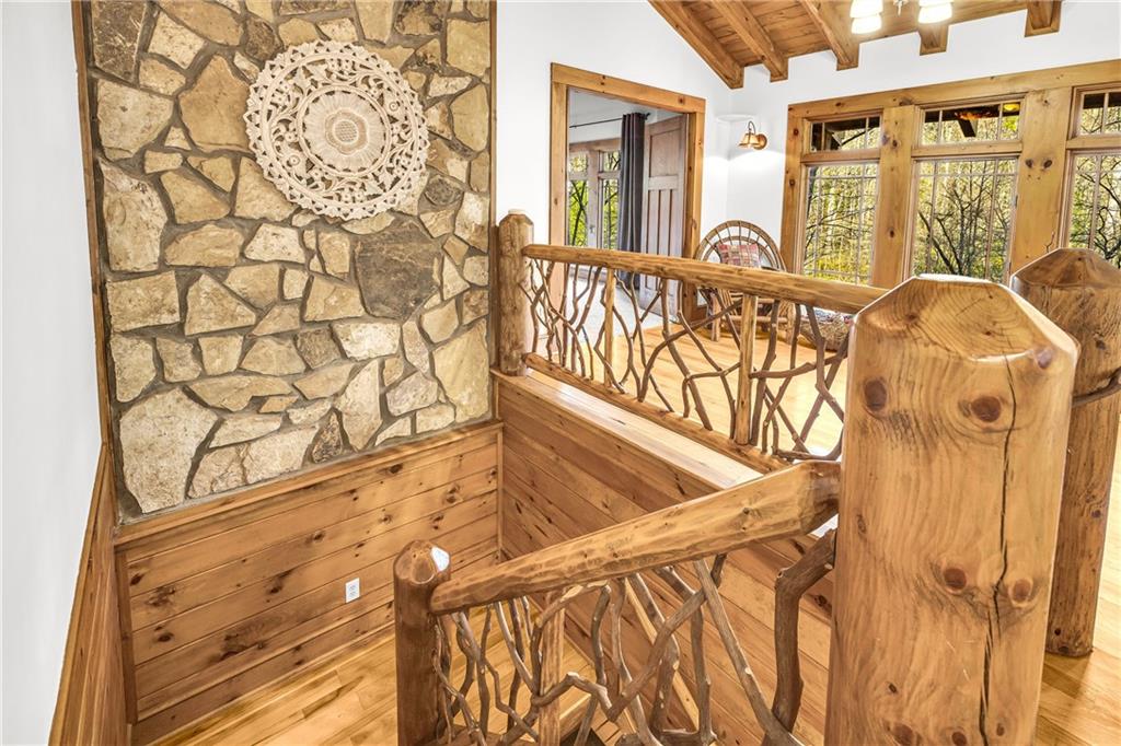 740 Little Rock Creek Road Cherry Log, GA 30522 - Photo 39 of 98 a view of a balcony with furniture and wooden floor