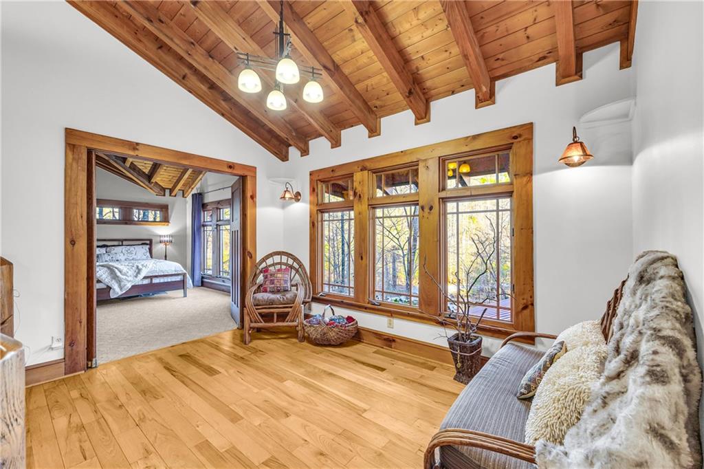 740 Little Rock Creek Road Cherry Log, GA 30522 - Photo 42 of 98 a bedroom with furniture and large windows
