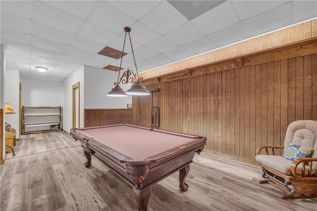 740 Little Rock Creek Road Cherry Log, GA 30522 - Photo 75 of 98 a room with wooden floor pool table and chairs