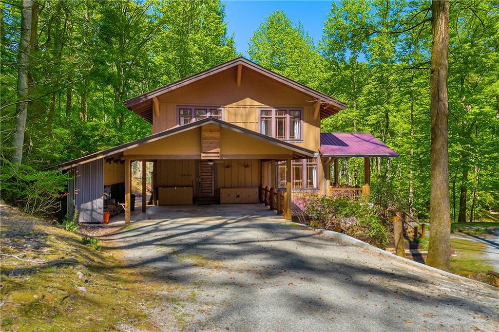 740 Little Rock Creek Road Cherry Log, GA 30522 - Photo 80 of 98 a front view of a house with yard and porch