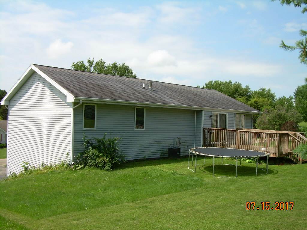 2276 Drexel Road Davis, IL 61019 - Photo 5 of 17 a front view of a house with garden