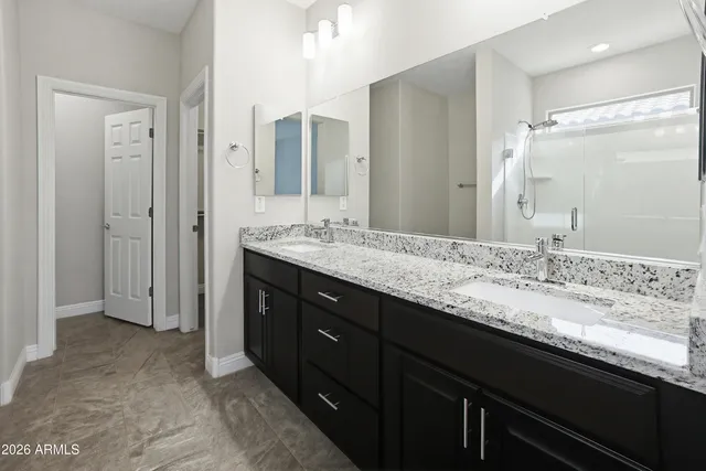 a building outdoor space with patio furniture and potted plants