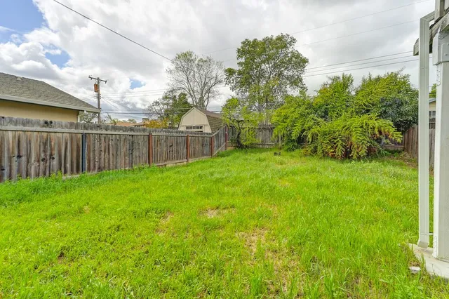 a view of a backyard with a garden