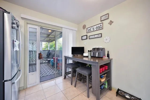 a room with furniture and a flat screen tv