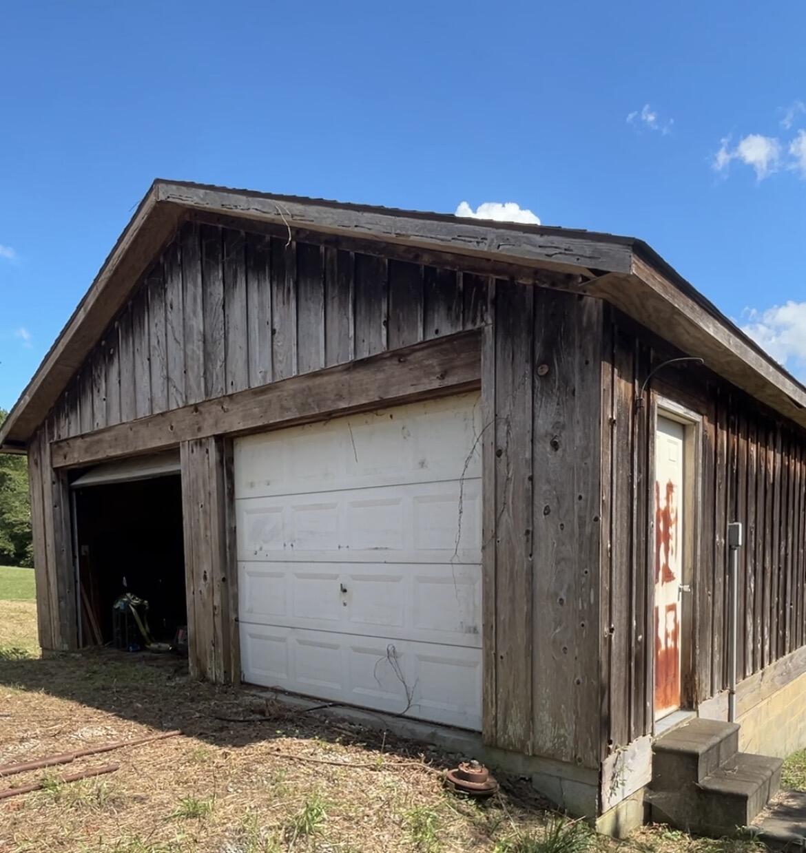 726 Old Brown Road Salvisa, KY 40372 - Photo 74 of 89 Additional garage, 2 car with a small barn area under neath the rear. (2 stall area)