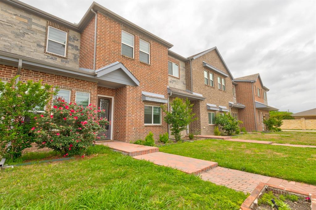 6043 Rivendell Drive Frisco, TX 75035 - Photo 2 of 38 a front view of a house with a yard and trees