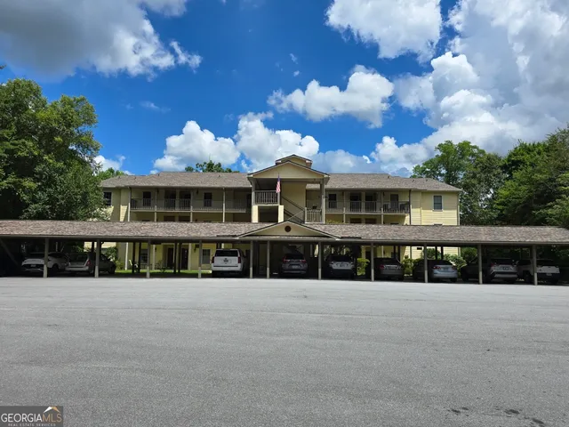 a view of a house with a swimming pool