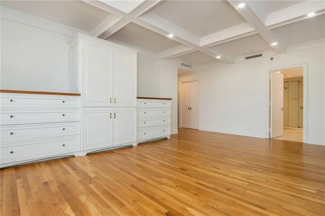 a bathroom with a double vanity sink mirror and shower