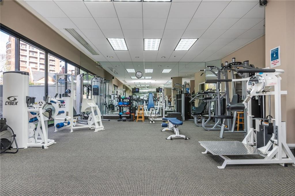 2660 Peachtree Road Northwest, Unit 22E Atlanta, GA 30305 - Photo 32 of 48 a view of a room with gym equipment