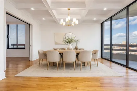 an empty room with wooden floor