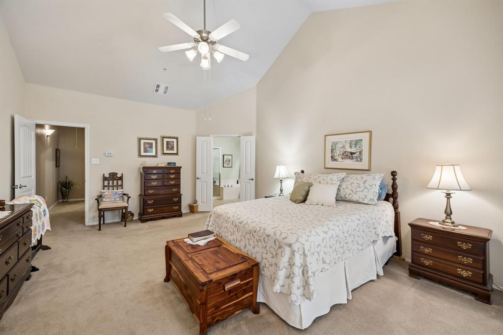 2003 Downing Street Allen, TX 75013 - Photo 20 of 40 This view of the bedroom really shows the impressive size and yet comfortable feel of the relaxing retreat.