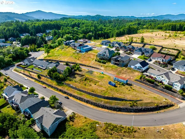 a view of a swimming pool with a lawn chairs