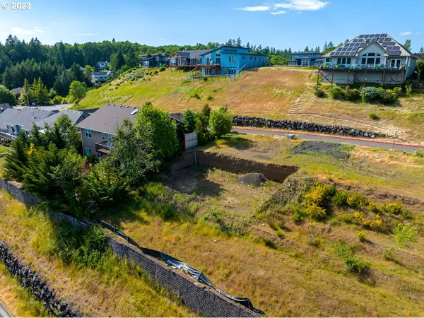 a view of a swimming pool with an outdoor seating