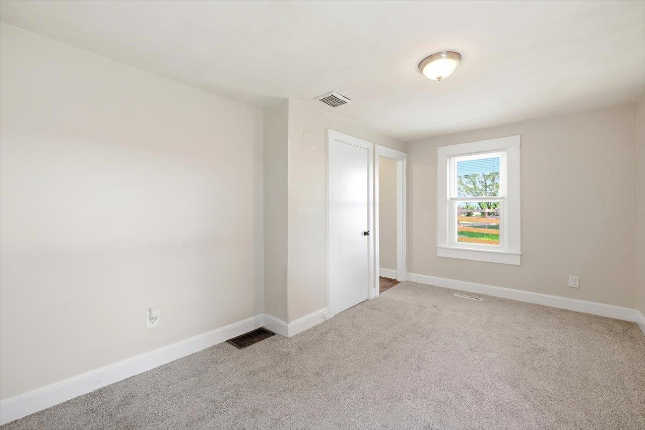 5096 Battlefield Road Harrisonburg, VA 22801 - Photo 17 of 38 an empty room with windows