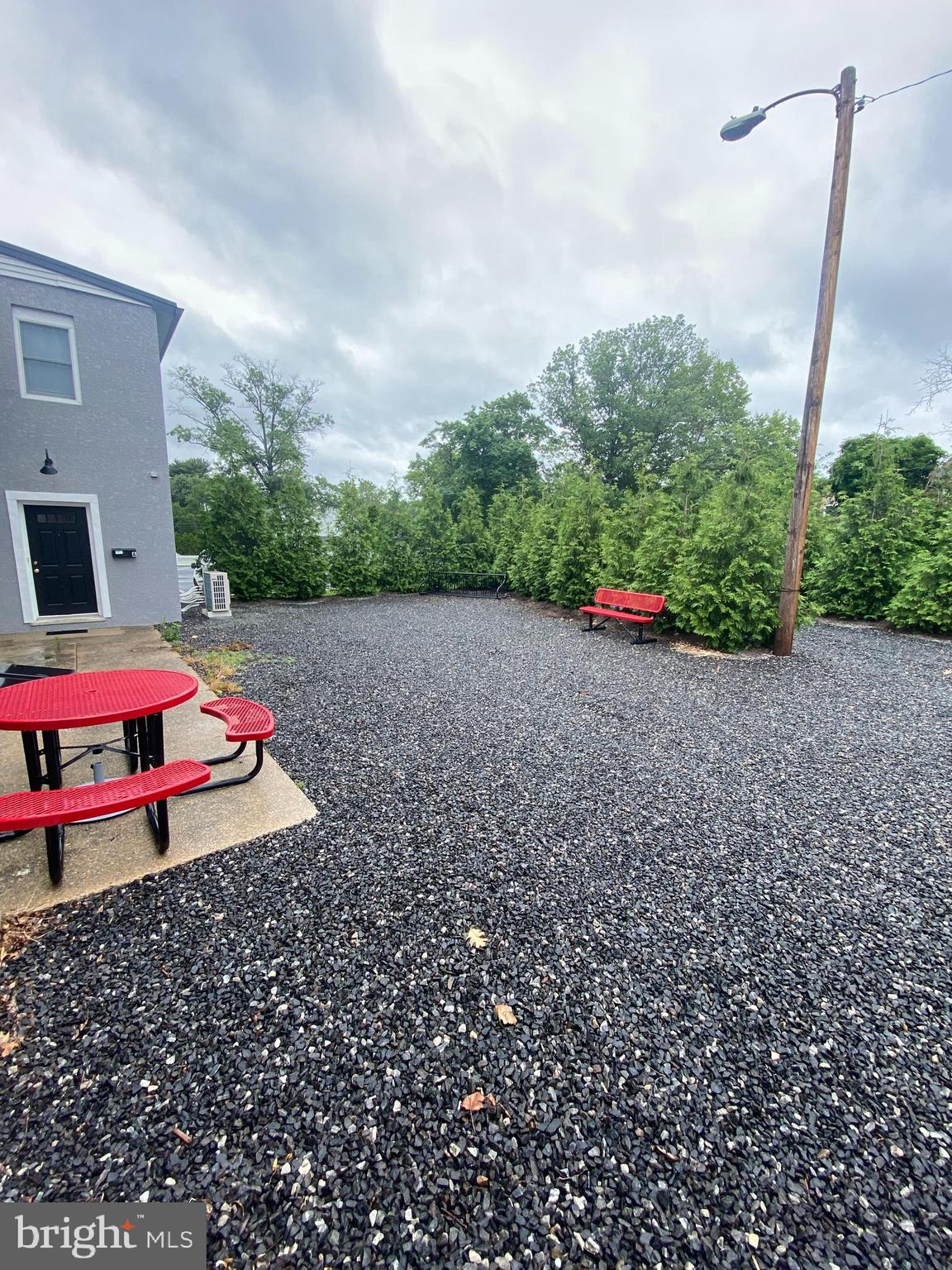 67 Main Street, Unit A Mantua, NJ 08051 - Photo 13 of 13 an outdoor space with furniture and garden